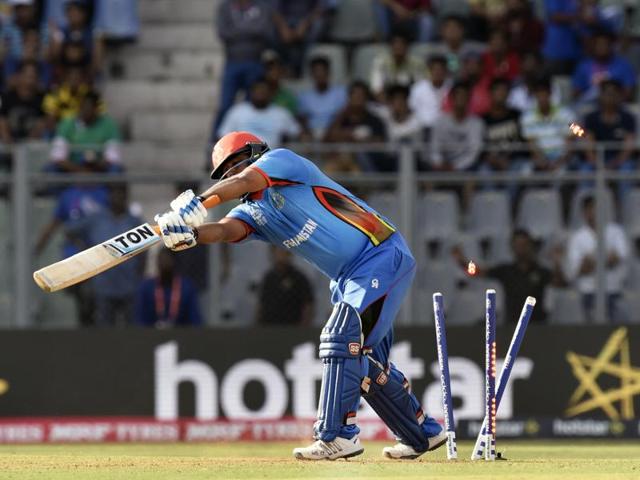 Mohammad Shahzad is bowled by Chris Morris. (Anshuman Poyrekar/HT Photo) Mohammad Shahzad is bowled by Chris Morris. (Anshuman Poyrekar/HT Photo)