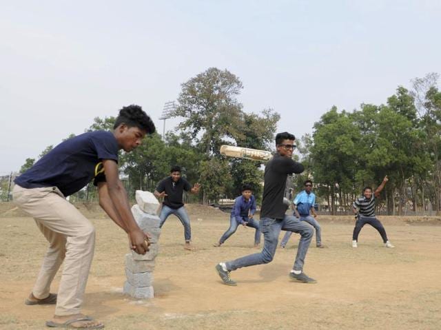 Youth plays cricket at Morhabadi locality in Ranchi. As cricket fever catches India. (Diwakar Prasad/HT Photo)