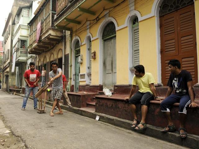 Due to Scarcity of ground, gully (street) cricket is very popular among youth. Here, youngsters are enjoying gully cricket as ICC World T 20 Cup 2016 catches on. (Samir Jana/HT Photo)