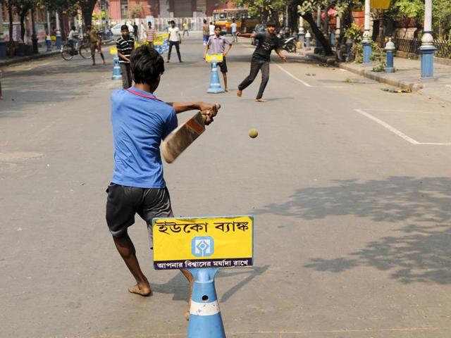 Children play Cricket at BBD Baag as the T20 World cup fever grips India. (Subhankar Chakraborty/HT Photo)