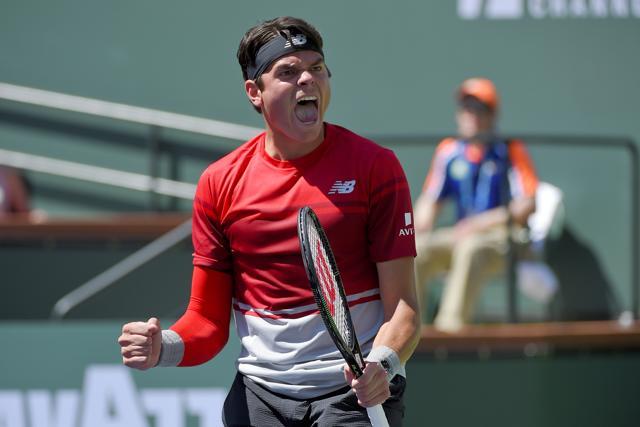 Milos Raonic celebrates his win over David Goffin. (AP) Milos Raonic celebrates his win over David Goffin. (AP)