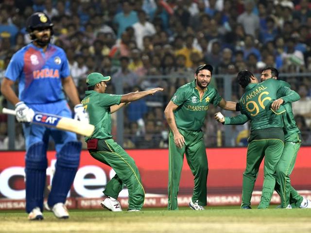 Pakistan team captain Shahid Afridi celebrates the dismissal of Indian player Rohit Sharma . (Ajay Aggarwal/HT PHoto) Pakistan team captain Shahid Afridi celebrates the dismissal of Indian player Rohit Sharma . (Ajay Aggarwal/HT PHoto)