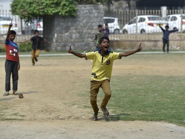 Mohalla cricket is a popular cricket form in India being played here in South Delhi. (Saumya Khandelwal/HT Photo)