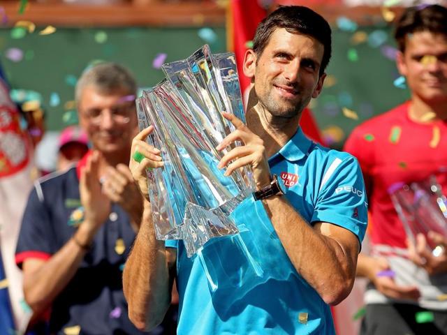 Novak Djokovic defeated Milos Raonic to claim a record 5th title at Indian Wells. (AFP) Novak Djokovic defeated Milos Raonic to claim a record 5th title at Indian Wells. (AFP)