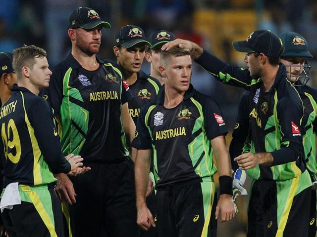 Australia's Adam Zampa celebrates with teammates the dismissal of Bangladesh's Shuvagata Hom. (AP Photo) Australia's Adam Zampa celebrates with teammates the dismissal of Bangladesh's Shuvagata Hom. (AP Photo)