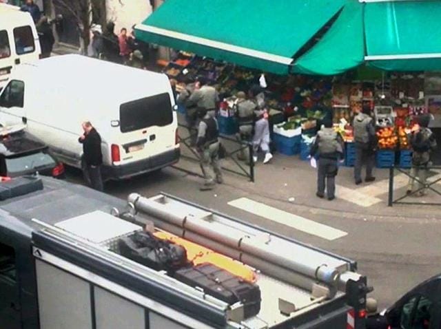 A suspect (C, white shoes) is apprehended by armed Belgian police in Molenbeek, near Brussels, Belgium, in this still image taken from video shot on March 18, 2016. (REUTERS) A suspect (C, white shoes) is apprehended by armed Belgian police in Molenbeek, near Brussels, Belgium, in this still image taken from video shot on March 18, 2016. (REUTERS)
