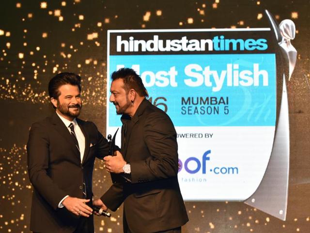 Sanjay Dutt receives an award by Anil Kapoor at HT Most Stylish Awards. (Pratham Gokhale/HT Photo) 