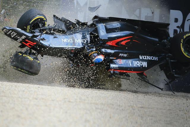 Fernando Alonso’s McLaren crashed upside down at high speed into a safety barrier. (AFP) Fernando Alonso’s McLaren crashed upside down at high speed into a safety barrier. (AFP)