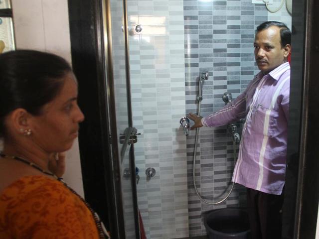 A plumber checks taps and pipes for leaks at a housing society.(Bhushan Koyande)