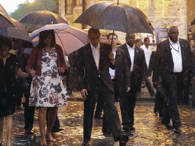 US President Barack Obama tours Old Havana with his family at the start of a three-day visit to Cuba, in Havana. (Reuters Photo) US President Barack Obama tours Old Havana with his family at the start of a three-day visit to Cuba, in Havana. (Reuters Photo)