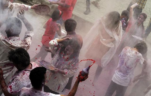 Pakistani Hindus apply coloured powder during Holi celebrations in Lahore. (AFP File Photo) Pakistani Hindus apply coloured powder during Holi celebrations in Lahore. (AFP File Photo)
