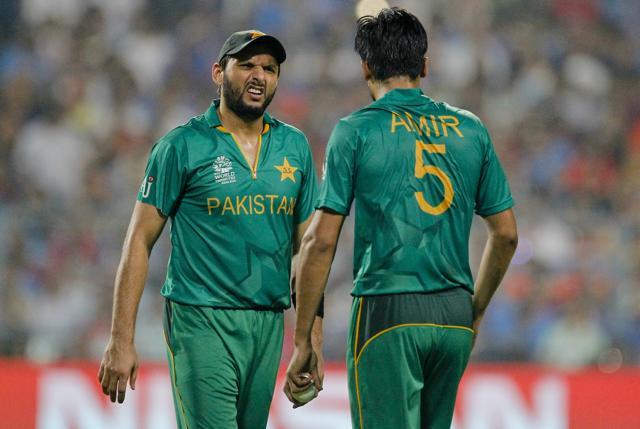 Pakistan's Shahid Afridi talks to Mohammad Amir during the World T20 match against India at Eden Gardens in Kolkata. (AP) Pakistan's Shahid Afridi talks to Mohammad Amir during the World T20 match against India at Eden Gardens in Kolkata. (AP)