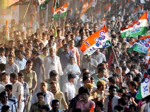 TMC chief and West Bengal Chief Minister Mamata Banerjee supporters at an election campaign rally for Assembly polls, in Kolkata on Tuesday. (PTI) TMC chief and West Bengal Chief Minister Mamata Banerjee supporters at an election campaign rally for Assembly polls, in Kolkata on Tuesday. (PTI)