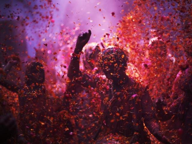 Widow daubed in colours dance as they take part in the Holi celebrations at Vrindavan. (REUTERS) Widow daubed in colours dance as they take part in the Holi celebrations at Vrindavan. (REUTERS)