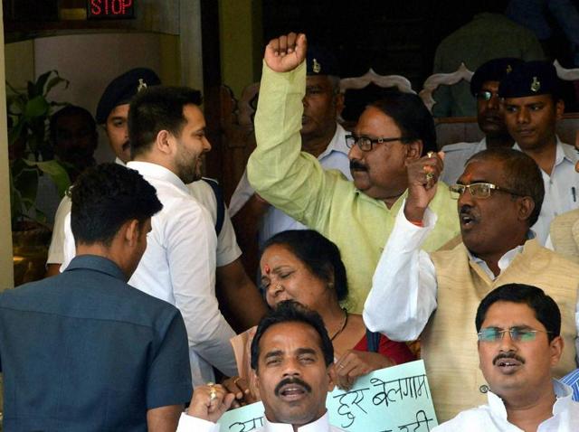 Opposition legislators demonstrated in front of the legislative assembly during the Bihar budget session in Patna.(PTI photo) Opposition legislators demonstrated in front of the legislative assembly during the Bihar budget session in Patna.(PTI photo)