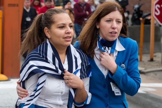 Two women walk away from Brussels airport after explosions rocked the facility in Brussels, Belgium on Tuesday. (AP Photo) Two women walk away from Brussels airport after explosions rocked the facility in Brussels, Belgium on Tuesday. (AP Photo)