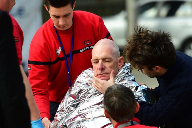 A victim receives first aid by rescuers, on Tuesday after two explosions ripped through the Brussels airport. (AFP Photo) A victim receives first aid by rescuers, on Tuesday after two explosions ripped through the Brussels airport. (AFP Photo)