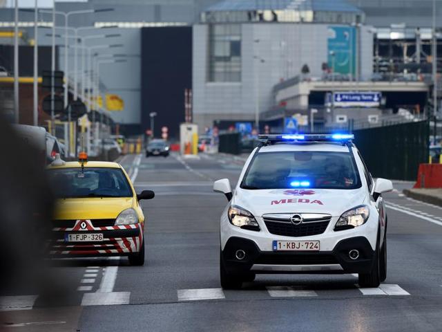 A car of Brussels airport medical assistance the airport in Zaventem following twin blasts.(AFP)