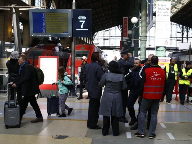 French railway workers stand in the Gare du Nord train station, where high speed trains depart to Brussels, Tuesday. (AP) French railway workers stand in the Gare du Nord train station, where high speed trains depart to Brussels, Tuesday. (AP)