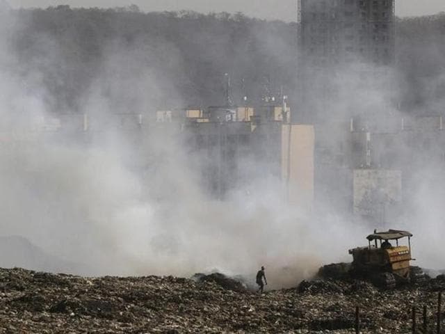 If the BMC wants to stop the frequent fires at its landfills, two remedial measures are imperative: Stop unauthorised persons from entering the dump and a mechanism to extract the methane trapped under the garbage.(Reuters)