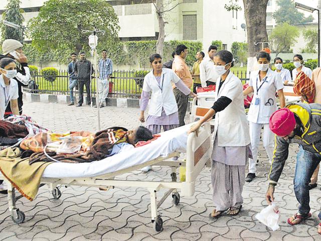 Patients outside the building of Mohandai Oswal Hospital which went up in flames, in Ludhiana on Monday.(JS Grewal/HT Photo) Patients outside the building of Mohandai Oswal Hospital which went up in flames, in Ludhiana on Monday.(JS Grewal/HT Photo)