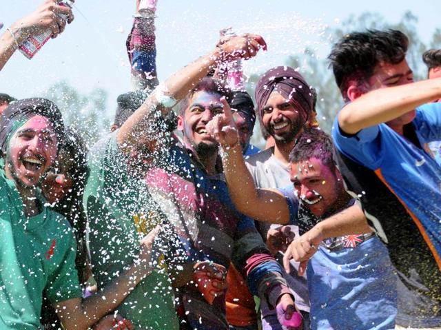 Holi celebrations start on the night before Holi with a Holika bonfire where people gather, sing, dance and party. (Bharat Bhushan/HT Photo)