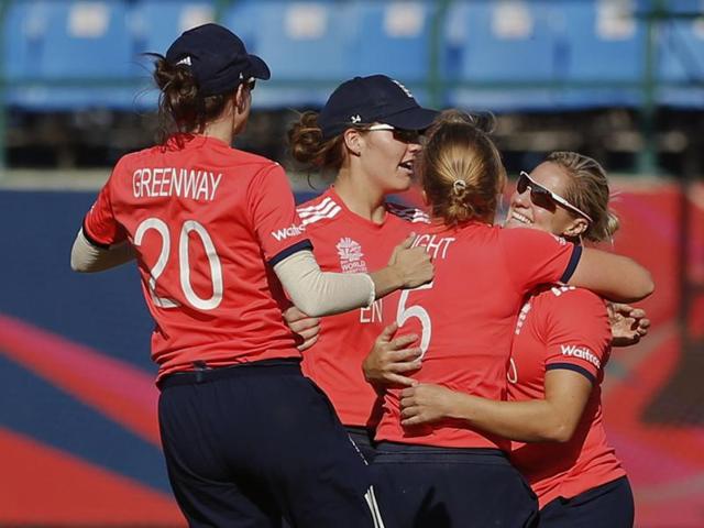 England's team members congratulate Katherine Brunt, first right, after she took a catch to dismiss India's Shikha Pandey during the Women's ICC World T20 cricket match at the Himachal Pradesh Cricket Association (HPCA) stadium in Dharamsala on March 22, 2016. (AP) England's team members congratulate Katherine Brunt, first right, after she took a catch to dismiss India's Shikha Pandey during the Women's ICC World T20 cricket match at the Himachal Pradesh Cricket Association (HPCA) stadium in Dharamsala on March 22, 2016. (AP)