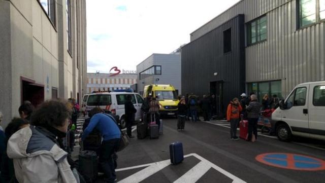 People at the scene of the explosions at Zaventem airport near Brussels, Belgium. (REUTERS) People at the scene of the explosions at Zaventem airport near Brussels, Belgium. (REUTERS)