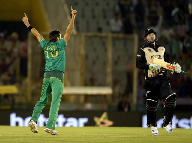 Pakistan Team Captain Shahid Afridi celebrating with other team after dismissal of Kane Williamson.  (Ravi Kumar/HT Photo) 
