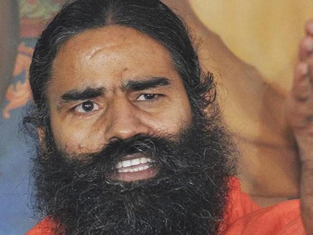 Uttarakhand Congress president Kishore Upadhyay said he had enough evidence to show Ramdev was in touch with nine Congress MLAs who revolted against the party.(Parveen Kumar/HT File Photo)