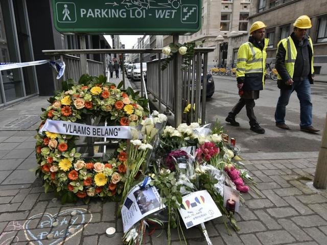 Flowers are placed near the metro station Maelbeek in Brussels.(AP Photo)