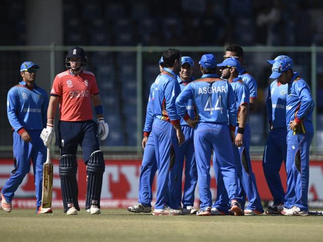 Afghanistan team members celebrate the wicket of Joe Root. (Mohd Zakir/HT Photo) Afghanistan team members celebrate the wicket of Joe Root. (Mohd Zakir/HT Photo)