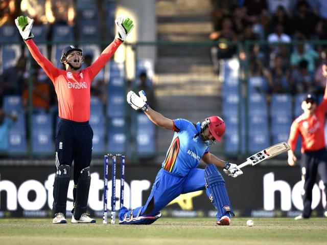 England wicketkeeper Jos Buttler appeals for the wicket of Afghanistan’s Samiullah Shenwari. (Mohd Zakir/HT Photo) England wicketkeeper Jos Buttler appeals for the wicket of Afghanistan’s Samiullah Shenwari. (Mohd Zakir/HT Photo)