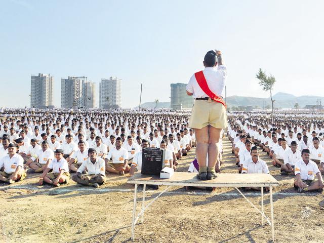 File photo of RSS activists taking out a Path Sanchalan to mark its 90th foundation day on Dusshera in Indore, India, on Thursday, October 22, 2015.(Hindustan Times)