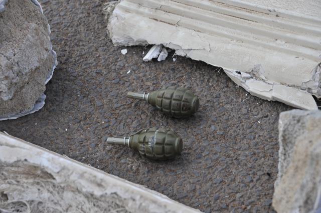 In this March 22 photo, two grenades are seen on a street near a hotel hosting an EU military training mission in Bamako. (AFP) In this March 22 photo, two grenades are seen on a street near a hotel hosting an EU military training mission in Bamako. (AFP)