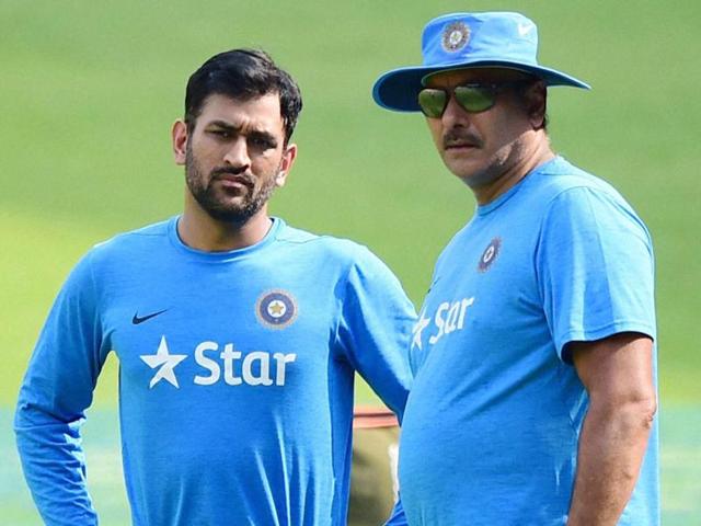 MS Dhoni with team director Ravi Shashtri during a training session at Chinnaswamy Stadium. (PTI Photo) MS Dhoni with team director Ravi Shashtri during a training session at Chinnaswamy Stadium. (PTI Photo)