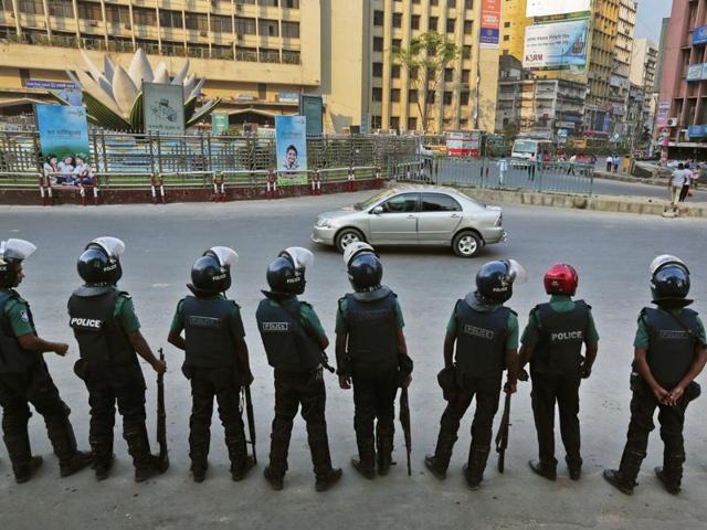 Bangladeshi policemen stand guard on a crossing in Dhaka. (AP File Photo) Bangladeshi policemen stand guard on a crossing in Dhaka. (AP File Photo)