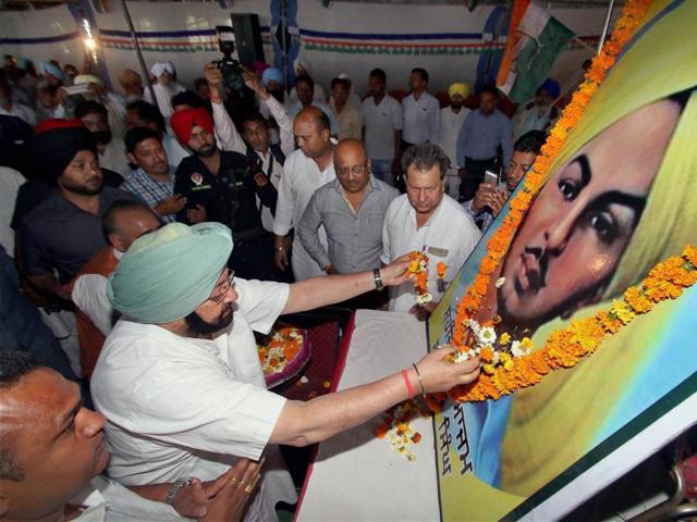 Punjab Congress chief Capt Amarinder Singh during a programme organised to pay homage to Bhagat Singh at his village, Khatkar Kalan. (PTI Photo) Punjab Congress chief Capt Amarinder Singh during a programme organised to pay homage to Bhagat Singh at his village, Khatkar Kalan. (PTI Photo)