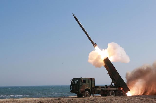 This undated picture released from North Korea's official Korean Central News Agency (KCNA) on March 24, 2016 shows the operation of a new type large-caliber multiple rocket launching system at an undisclosed location in North Korea. (AFP) This undated picture released from North Korea's official Korean Central News Agency (KCNA) on March 24, 2016 shows the operation of a new type large-caliber multiple rocket launching system at an undisclosed location in North Korea. (AFP)