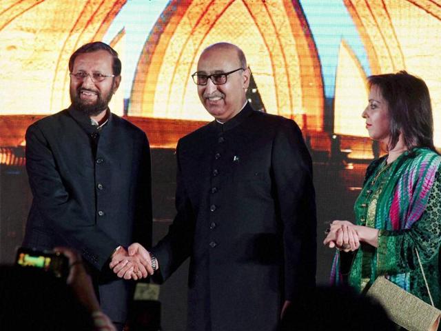 Union minister Prakash Javadekar shakes hands with Pakistan high commissioner Abdul Bashit on the occasion of Pakistan Day. (PTI) Union minister Prakash Javadekar shakes hands with Pakistan high commissioner Abdul Bashit on the occasion of Pakistan Day. (PTI)