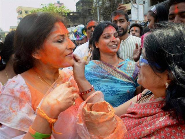 Film actress and BJP candidate for Howrah (North) Assembly constituency Rupa Ganguly plays Holi with party workers and starts her election campaign in Howrah city near Kolkata ( PTI Photo ) (PTI) Film actress and BJP candidate for Howrah (North) Assembly constituency Rupa Ganguly plays Holi with party workers and starts her election campaign in Howrah city near Kolkata ( PTI Photo ) (PTI)