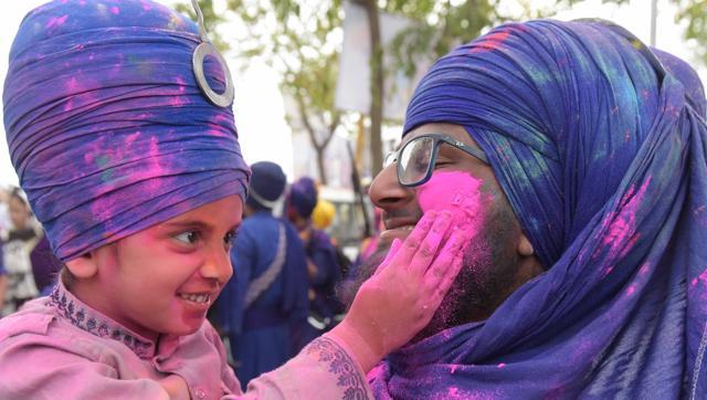 Riot of colours: Nihangs of all ages celebrating holi with religious fervor and elan at Holla Mohalla in Anandpur Sahib. (Sanjeev Sharma/HT Photo )