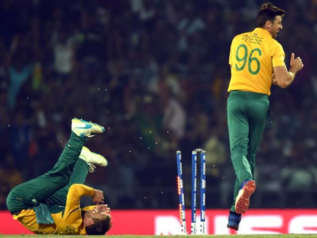 South Africa’s David Wiese and AB de Villiers celebrate the wicket of West Indies’ Andre Fletcher. (Kunal Patil/HT Photo) South Africa’s David Wiese and AB de Villiers celebrate the wicket of West Indies’ Andre Fletcher. (Kunal Patil/HT Photo)