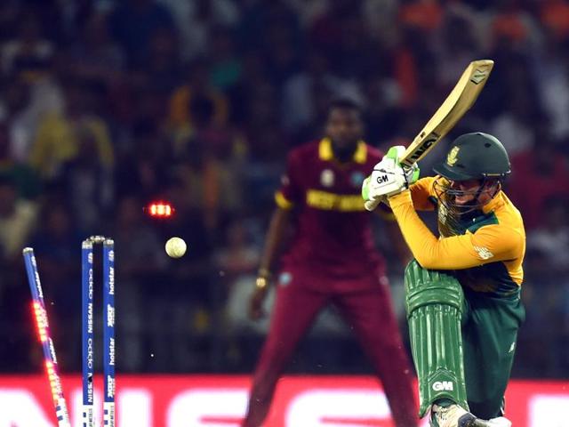 South Africa’s Quinton de Kock is bowled behind his legs by Andre Russell. (Kunal Patil/HT Photo) South Africa’s Quinton de Kock is bowled behind his legs by Andre Russell. (Kunal Patil/HT Photo)