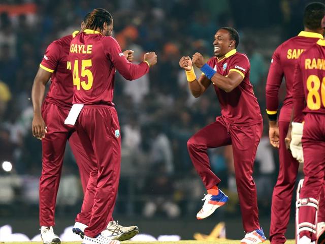 West Indies;s Chris Gayle and Dwayne Bravo celebrate the wicket of Rilee Rossouw with a little jig. (Kunal Patil/HT Photo) West Indies;s Chris Gayle and Dwayne Bravo celebrate the wicket of Rilee Rossouw with a little jig. (Kunal Patil/HT Photo)