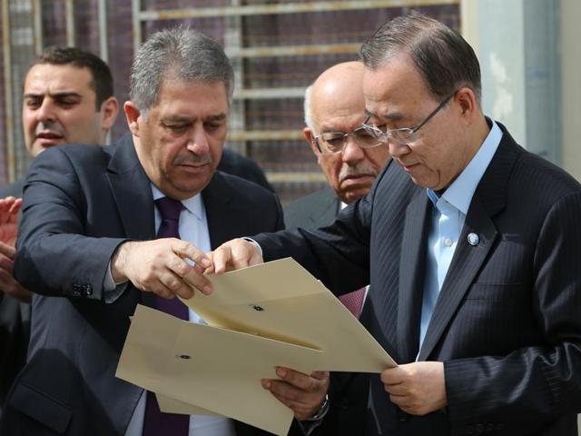 United Nations secretary general Ban Ki-moon, right, receives an envelope that has the map of Palestine during his visit to Aamaq school, in the Palestinian refugee camp of Nahr el-Bared . (AP) United Nations secretary general Ban Ki-moon, right, receives an envelope that has the map of Palestine during his visit to Aamaq school, in the Palestinian refugee camp of Nahr el-Bared . (AP)