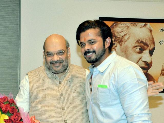 BJP President Amit Shah with Cricketer S Sreesanth during a meeting at Party’s office in New Delhi on Friday, March 25, 2016.(PTI)