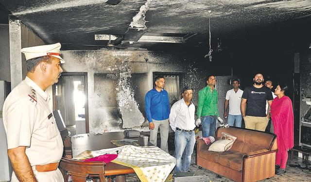 Police and forensic experts at the Sector-12 house in Panchkula on Wednesday. (Sant Arora/HT Photo)