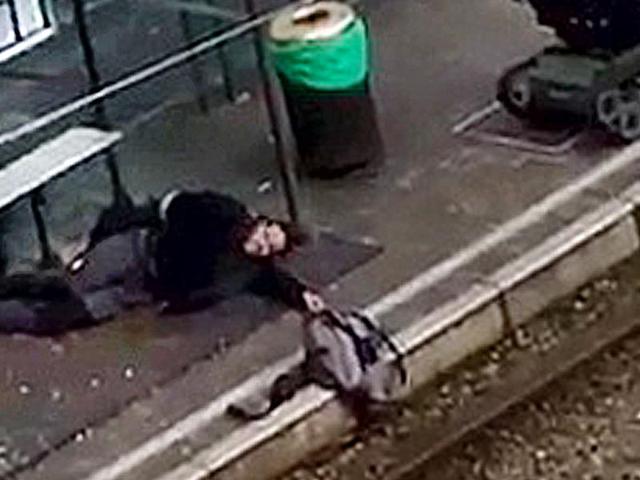 A suspect lies on the platform of a tramway station, in this image taken from amateur video, after he was shot and wounded by police in the Brussels borough of Schaerbeek following Tuesday's bombings in Brussels, Belgium, March 25, 2016.(REUTERS) A suspect lies on the platform of a tramway station, in this image taken from amateur video, after he was shot and wounded by police in the Brussels borough of Schaerbeek following Tuesday's bombings in Brussels, Belgium, March 25, 2016.(REUTERS)
