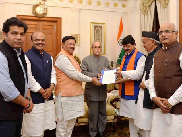 President Pranab Mukherjee meeting with a BJP delegation at Rashtrapati Bhavan in New Delhi on Saturday, March 26, 2016. (PTI) President Pranab Mukherjee meeting with a BJP delegation at Rashtrapati Bhavan in New Delhi on Saturday, March 26, 2016. (PTI)